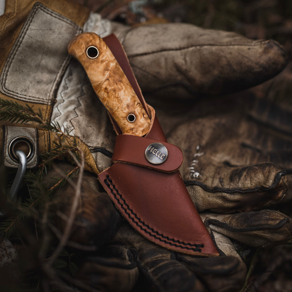 Helle Mandra H3LS Outdoor Knife with Leather Sheath in Sheath Outside