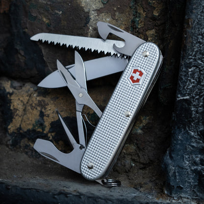 Farmer X Swiss Army Knife by Victorinox On a Rock Ledge